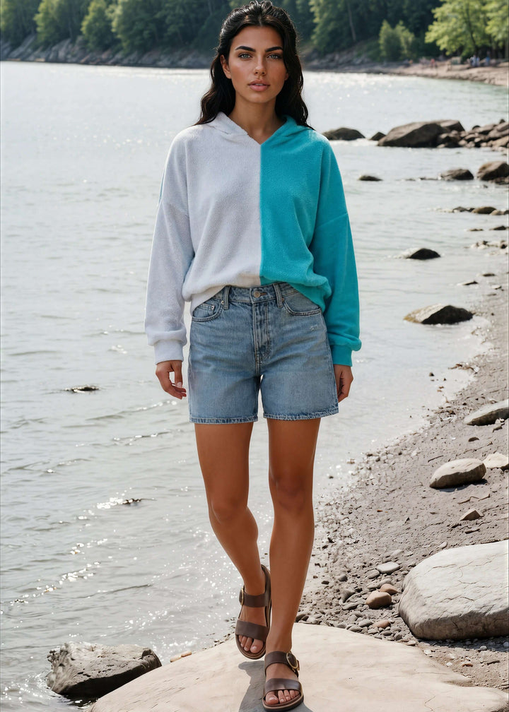 Cozy up in the Gina French Terry Hoodie, where aqua meets light gray in a playful color block design. Its relaxed fit and medium-weight fabric offer just the right amount of warmth, perfect for lounging or layering on cooler days. Bucket List Style