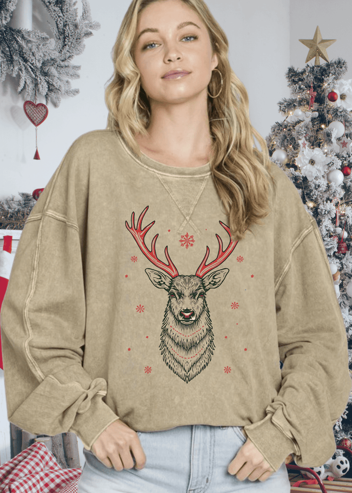 This vintage-inspired oversized sweatshirt features a striking Art Deco red antler reindeer graphic on mineral-washed antique mocha cotton. Crafted in the USA from premium 100% medium-weight cotton