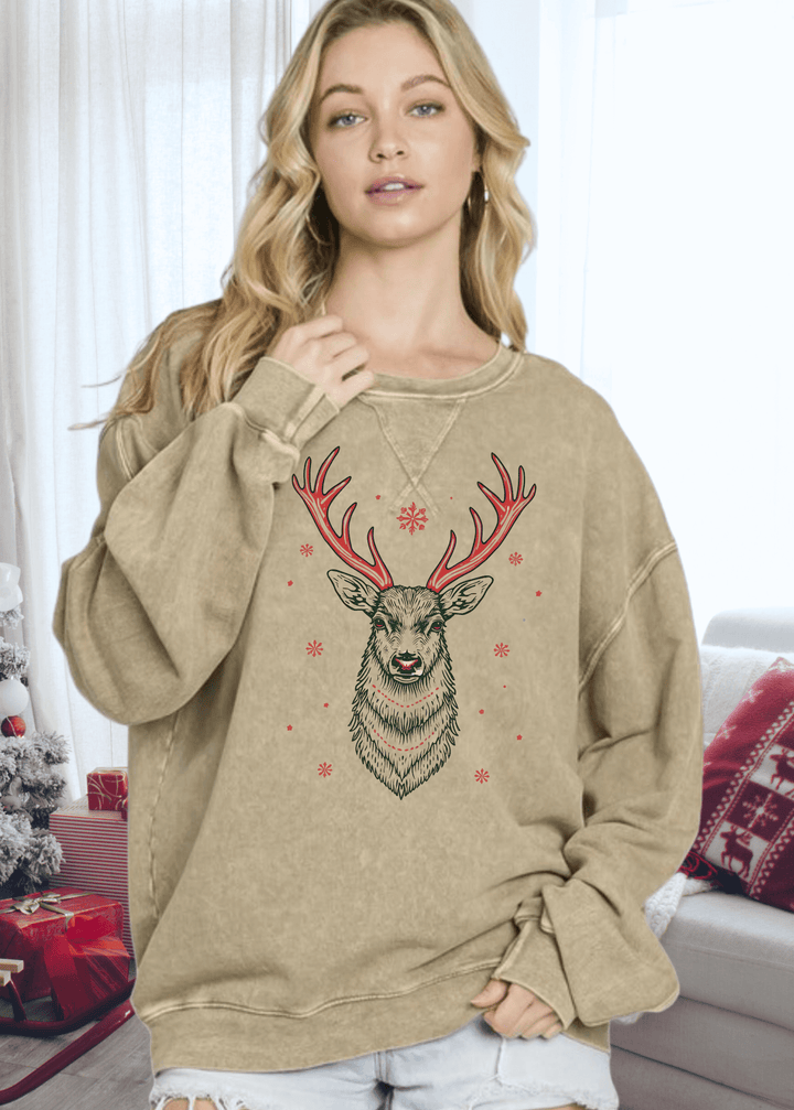 This vintage-inspired oversized sweatshirt features a striking Art Deco red antler reindeer graphic on mineral-washed antique mocha cotton. Crafted in the USA from premium 100% medium-weight cotton
