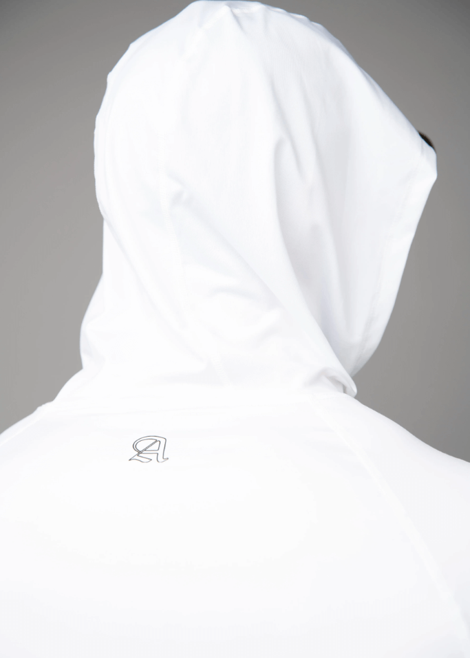 Introducing the 100% Made in USA White Hoodie — a lightweight, performance-driven solid white hoodie crafted for comfort, versatility, and style. Made with sueded, American-sourced fabric, it delivers unmatched softness, breathability, and 4-way stretch that moves with you through workouts, travel, or downtime.