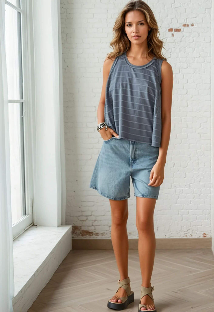 Meet your new go-to for relaxed comfort. This Made in USA striped tank top pairs casual ease with understated style—perfect for lazy mornings, weekend errands, or evenings at home. 