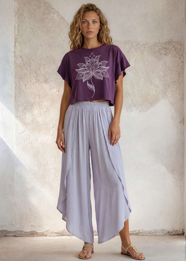 Relaxed boxy cropped top in pale periwinkle with a geometric flower print. 88% cotton French terry. Made in USA. Sizes S–L.