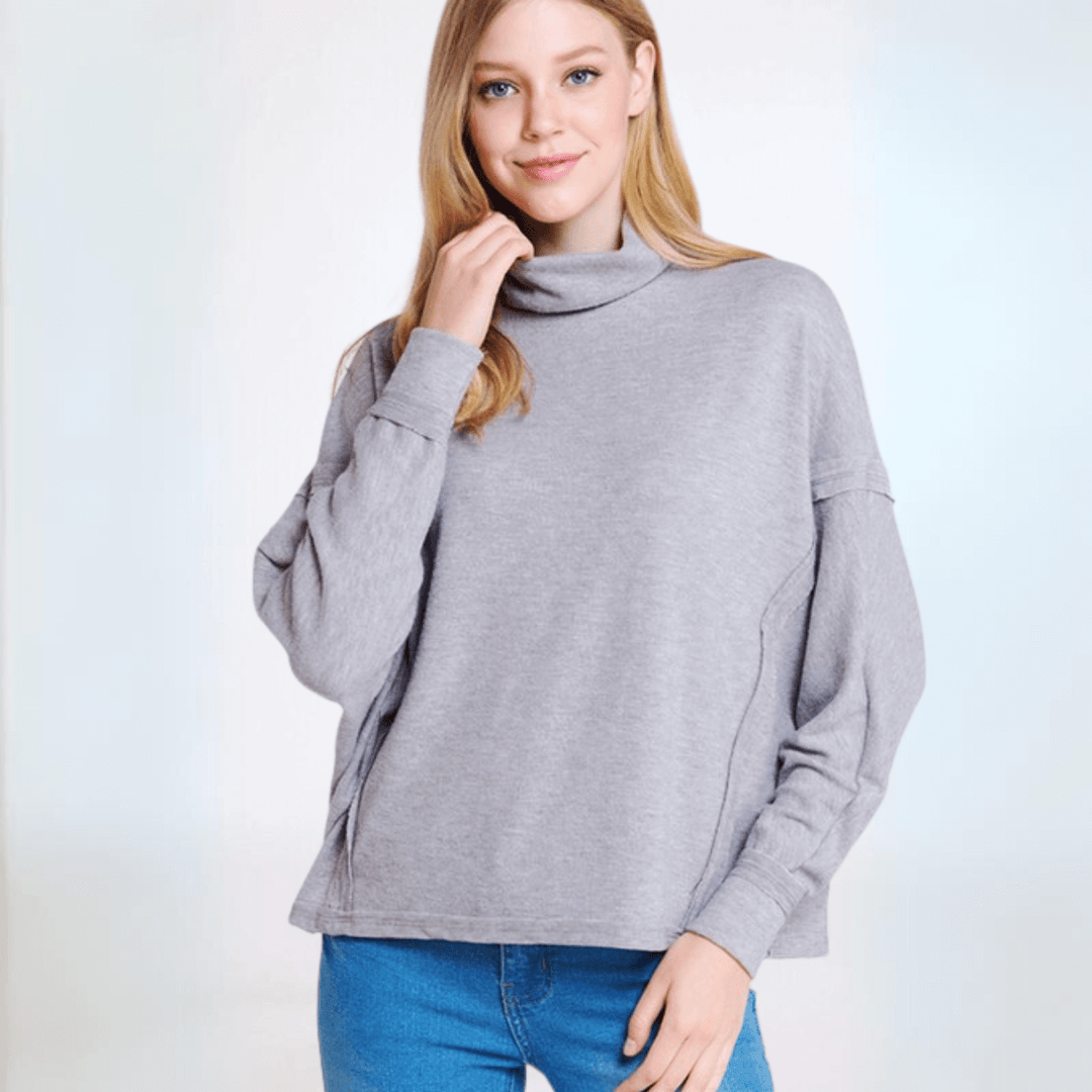 Made in USA Women's Light Grey Super Soft Turtle Neck Hacci Top with Raw Edge Inside Out Seams, Oversized Fit, Just Below Waist Length, Dolman Sleeves 