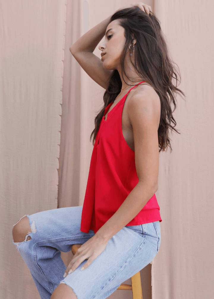 Meet your new go-to tank—the Star Neckline Tank Top in vibrant Tomato Red. Featuring a striking star cutout at the neckline and racerback spaghetti straps.  Made in the USA, it's the versatile piece every closet needs. 