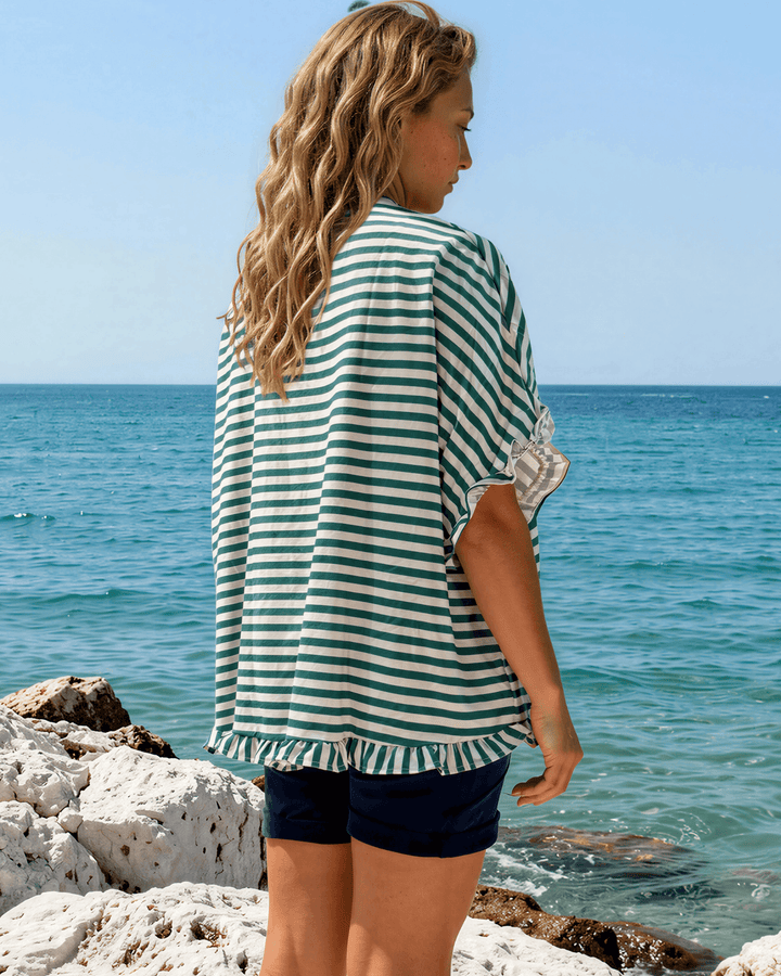 Effortlessly chic green &amp; white striped oversized top with ruffle cuffs &amp; button-up front. Lightweight, flowy fit perfect for spring &amp; summer. Made in USA.