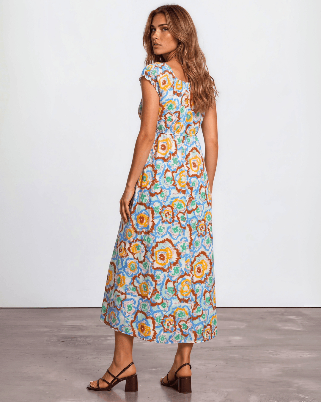 Our Sydney Sumer Vacation Sundress in Breezy rayon-linen blend, smocked waist &amp; bold colorful abstract floral print — your new vacation dress. Made in USA