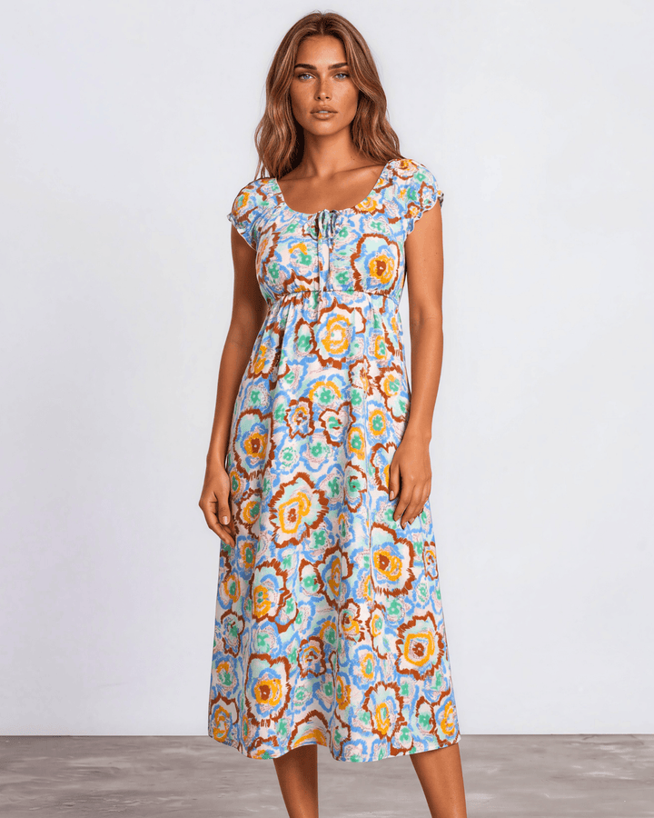 Our Sydney Sumer Vacation Sundress in Breezy rayon-linen blend, smocked waist &amp; bold colorful abstract floral print — your new vacation dress. Made in USA