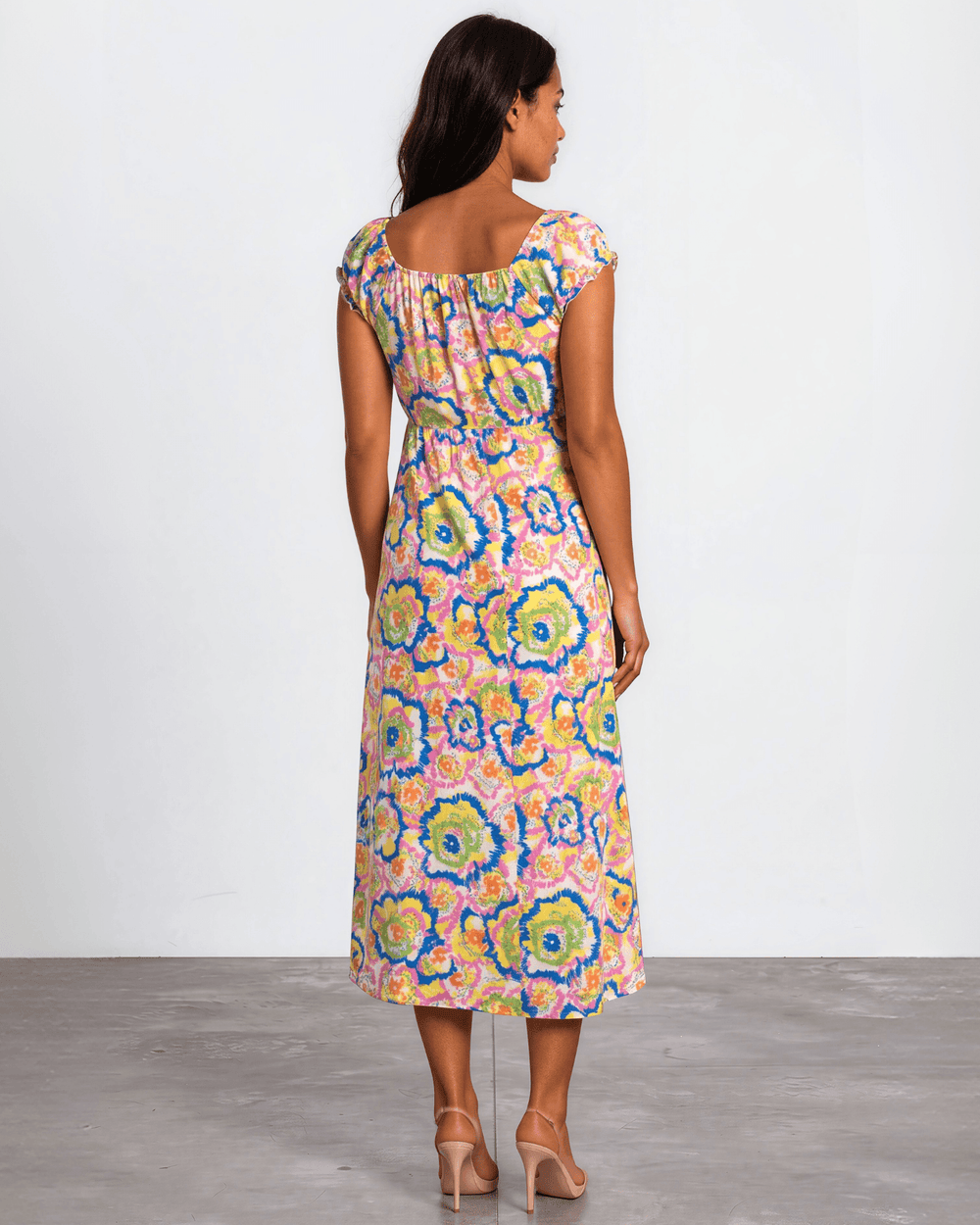 Our Sydney Sumer Vacation Sundress in Breezy rayon-linen blend, smocked waist & bold pink abstract floral print — your new vacation dress. Made in USA