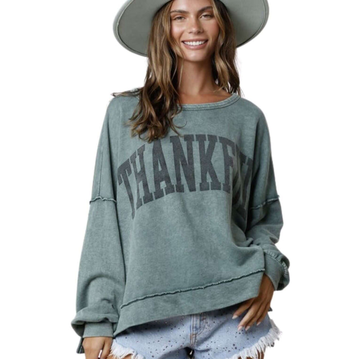 Made in USA Women's Oversized Graphic Garment Washed Vintage Look Sweatshirt with "Thankful" Graphic Lettering and Raw seam detail in Hunter Green | Classy Cozy Cool Women's Made in America Boutique