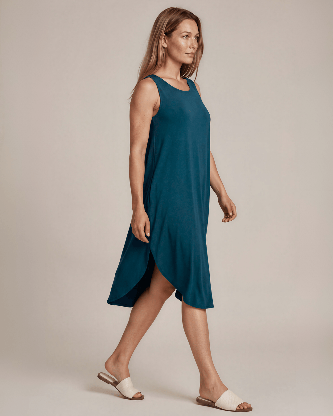 Shop the Sammie Sleeveless Maxi Dress in teal. Relaxed fit, scoop neck, side pockets &amp; slits. 95% Rayon, 5% Spandex. Made in USA. Free shipping may apply.