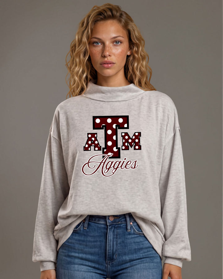 Texas A&amp;M Aggies gameday polka dot graphic mock neck sweatshirt in heather grey. Oversized, super soft, made in USA. Perfect gameday top. Sizes S–L.