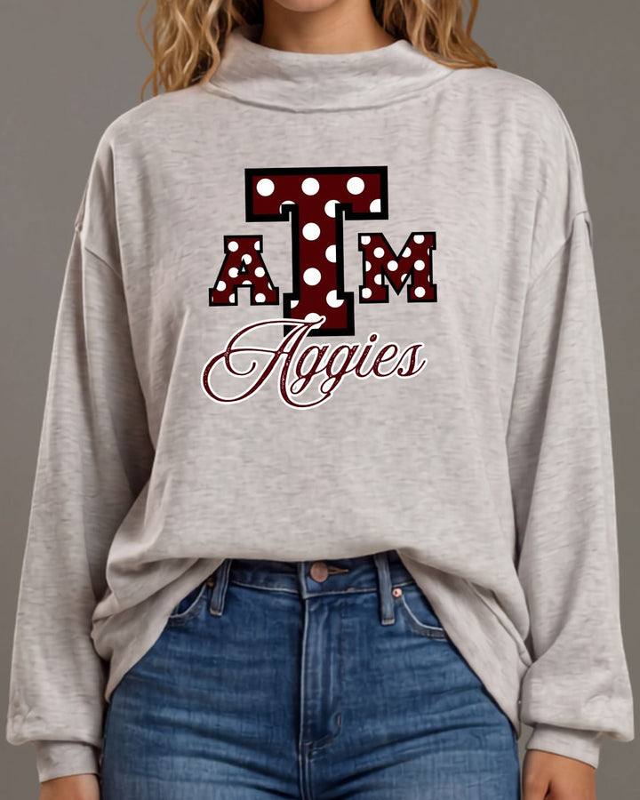 Texas A&amp;M Aggies gameday polka dot graphic mock neck sweatshirt in heather grey. Oversized, super soft, made in USA. Perfect gameday top. Sizes S–L.