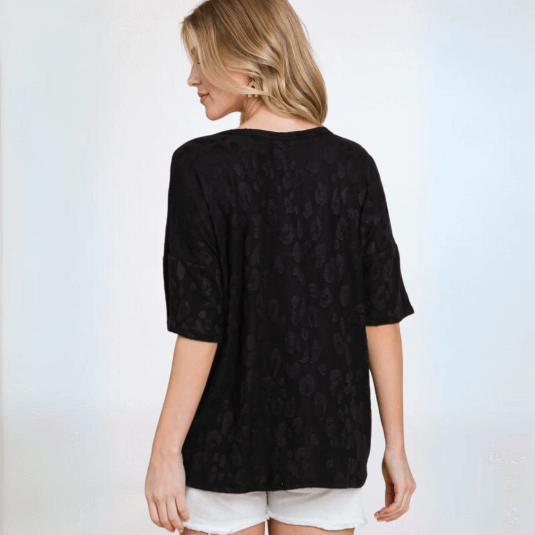 Made in USA Women's Very Soft Textured Animal Print Embossed Casual Short Sleeve Top with Button Detail in Black | Classy Cozy Cool Made in America Boutique