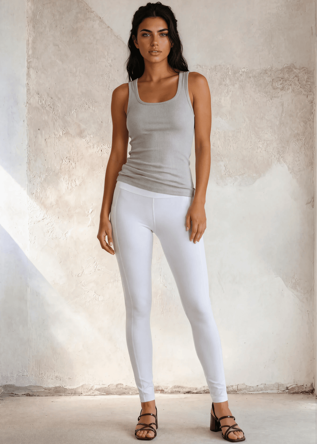 The Bra30 Tummy Tucker is an extra-long extra supportive racerback tank top that comfortably helps smooth out those unwanted lumps and bumps.  Cement Gray , Made in USA