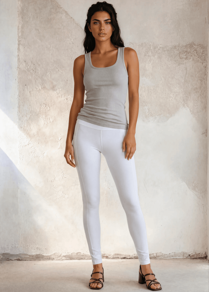 The Bra30 Tummy Tucker is an extra-long extra supportive racerback tank top that comfortably helps smooth out those unwanted lumps and bumps.  Cement Gray , Made in USA