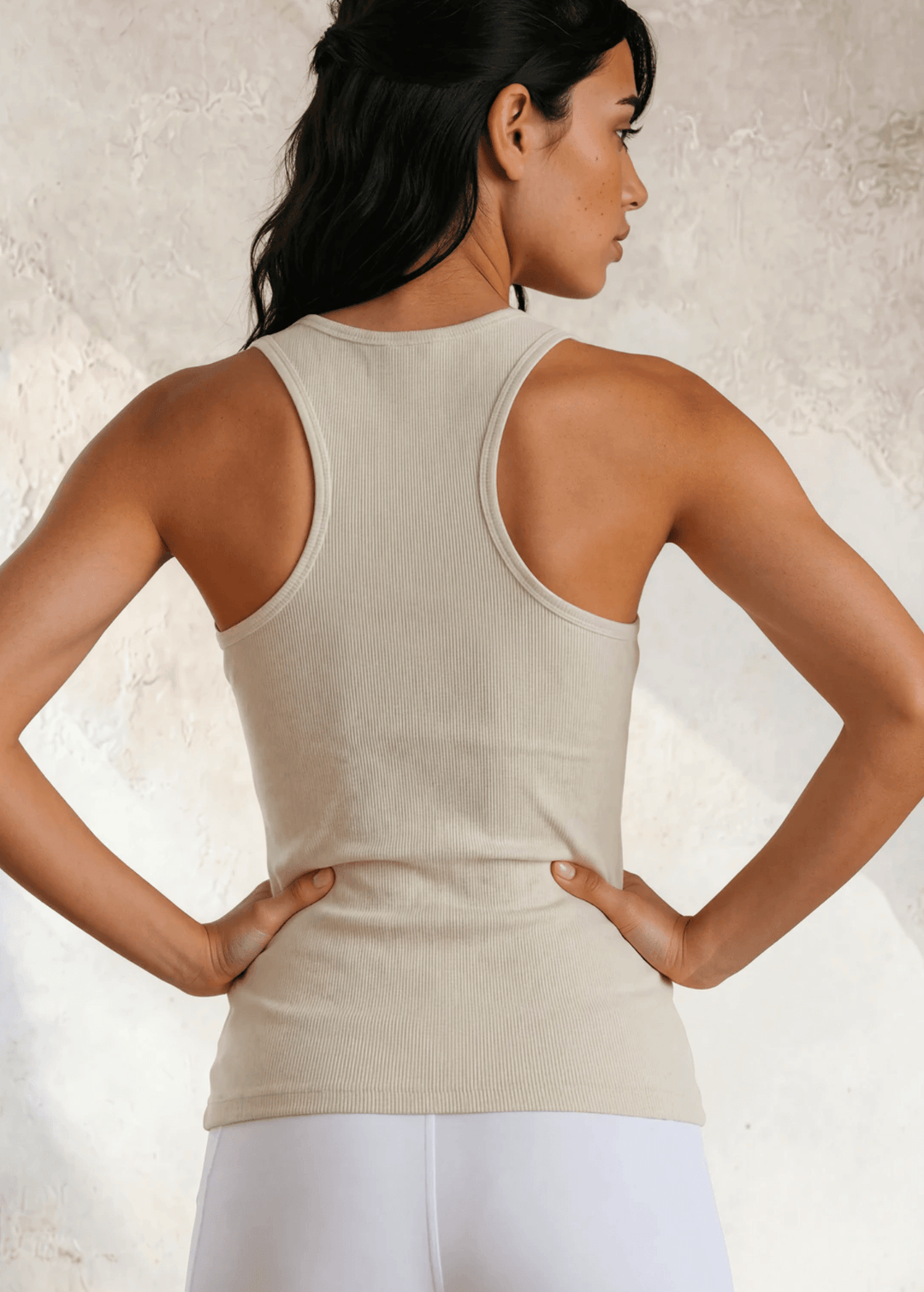 The Bra30 Tummy Tucker is an extra-long extra supportive racerback tank top that comfortably helps smooth out those unwanted lumps and bumps.  Egg Nog Cream Color , Made in USA