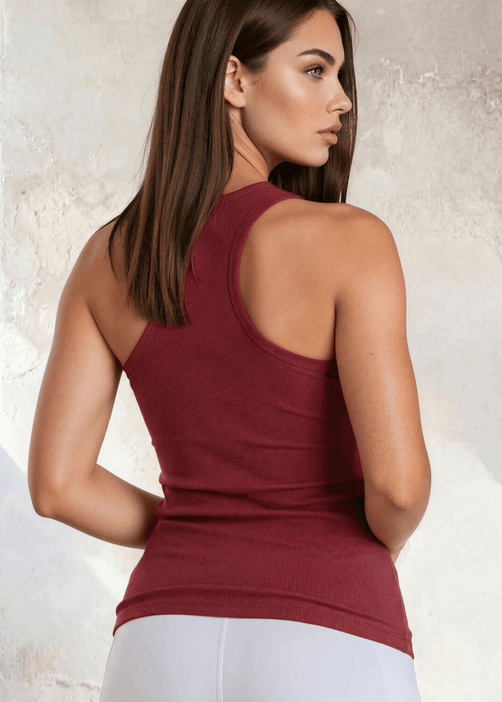 The Bra30 Tummy Tucker is an extra-long extra supportive racerback tank top that comfortably helps smooth out those unwanted lumps and bumps.  Dark Red Color , Made in USA