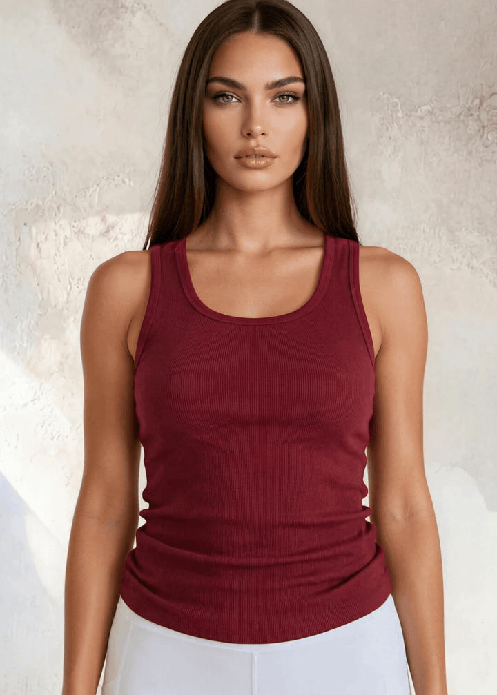 The Bra30 Tummy Tucker is an extra-long extra supportive racerback tank top that comfortably helps smooth out those unwanted lumps and bumps.  Dark Red Color , Made in USA