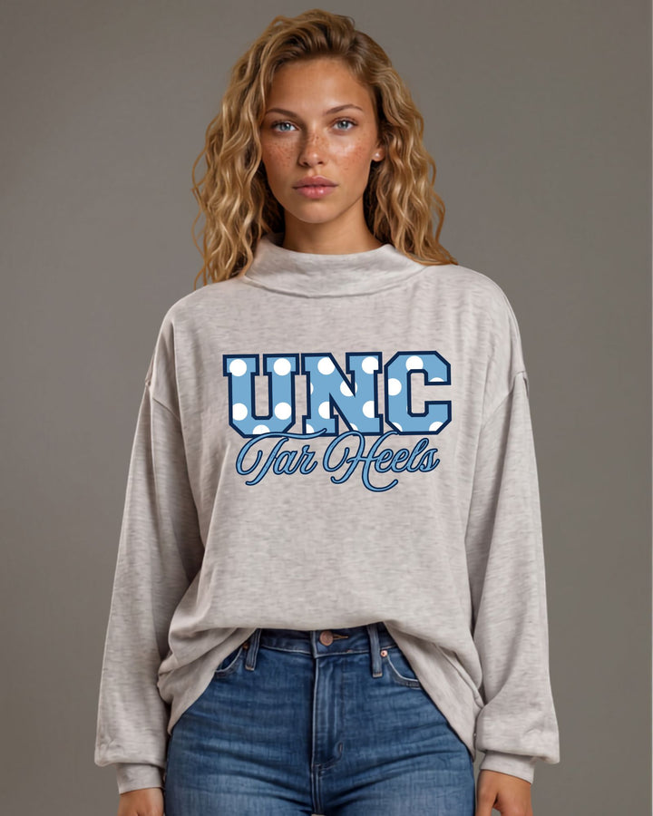 UNC Tar Heels gameday polka dot graphic mock neck sweatshirt in heather grey. Oversized, super soft, made in USA. Perfect gameday top. Sizes S–L.
