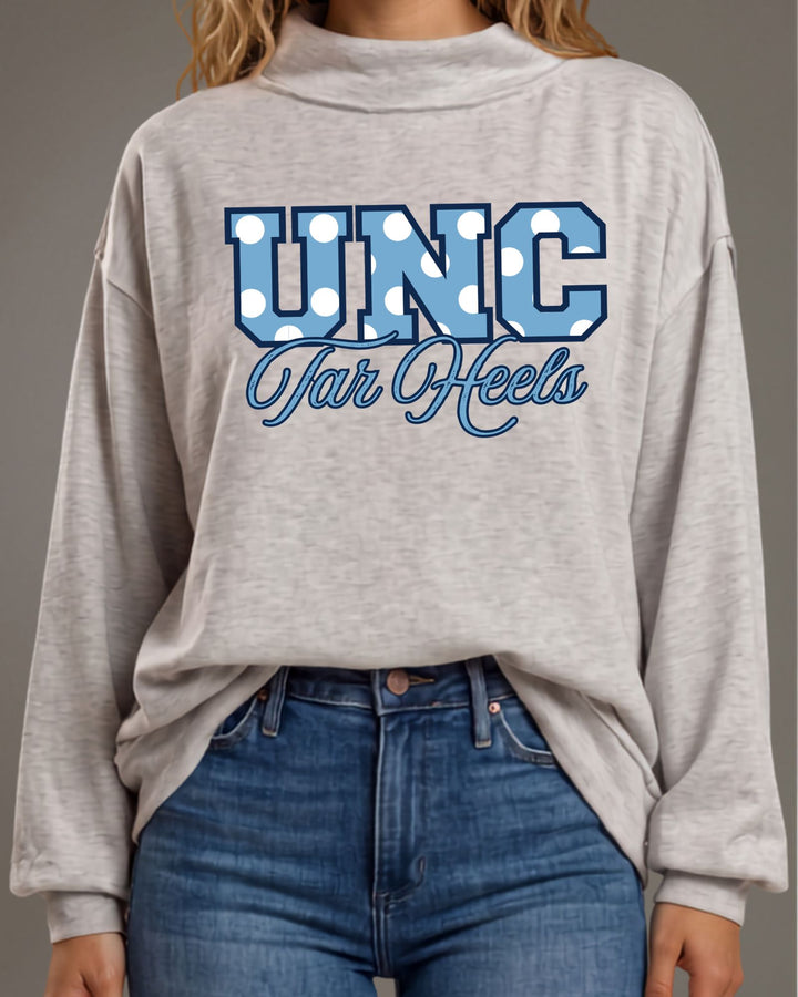 UNC Tar Heels gameday polka dot graphic mock neck sweatshirt in heather grey. Oversized, super soft, made in USA. Perfect gameday top. Sizes S–L.