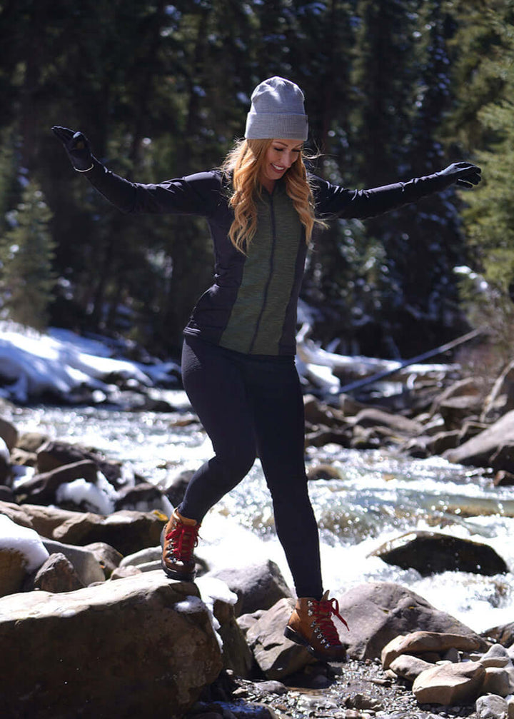 Made in USA Women's Moisture Wicking Full Zip Fitted Athletic Jacket, Machine wash, Advanced wicking properties, anti-microbial properties, and anti-snag technology ProWikMax™: 88% Polyester, 12% Spandex 4-way stretch compression for maximum comfort and performance WikMax™ material efficiently removes moisture from skin Antimicrobial technology inhibits bacterial growth and cuts down odor Brushed lining for soft hand and added warmth in Black and Army Green