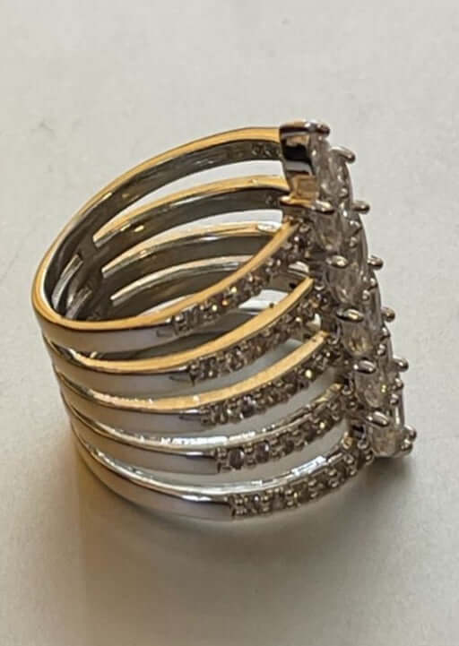 Made in USA, The Dance the Night Away Women's Fashion Jewelry Ring by Artist Anuja Tola is made of  Stainless Steel and 22 Karat Plating, accented with sparkling cubic zirconia stones 