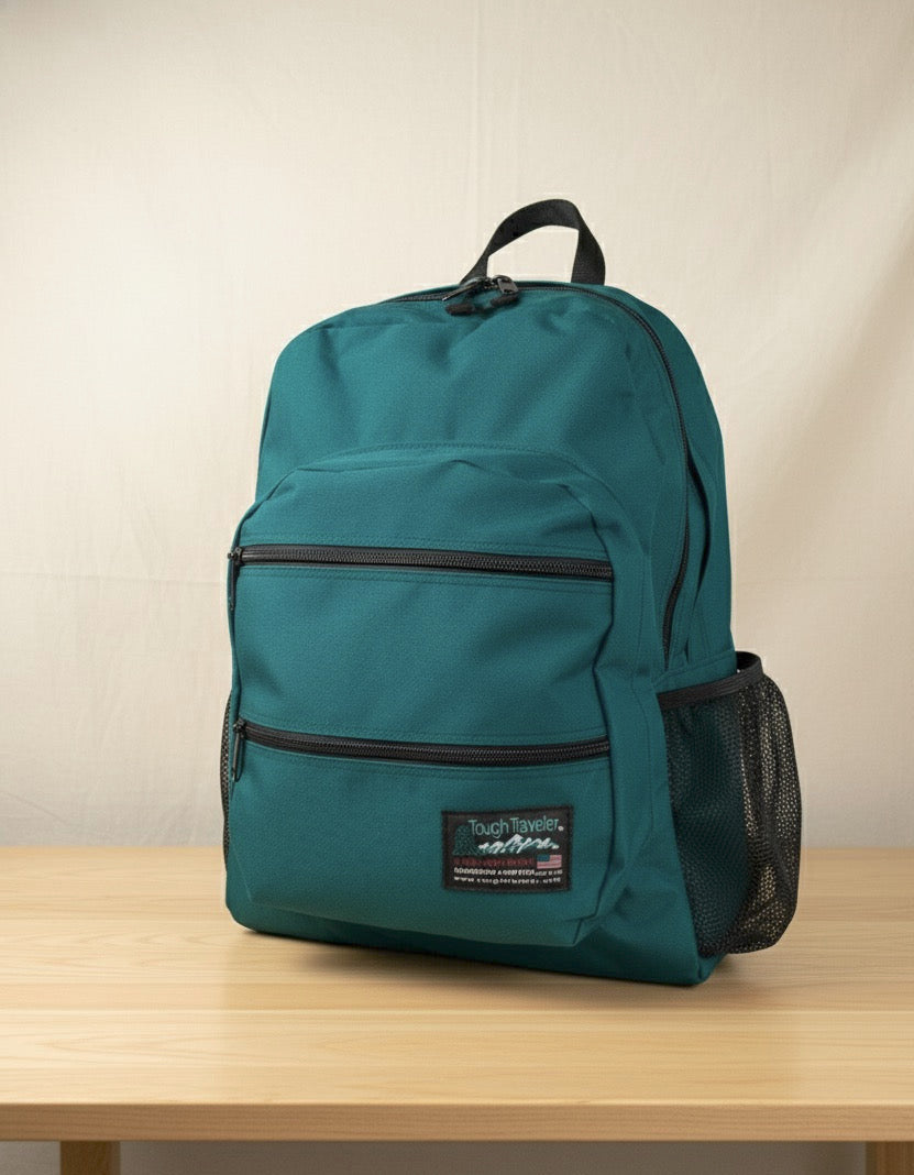 Made in USA, teal large backpack with two zippered front pockets and mesh side bottle pocket