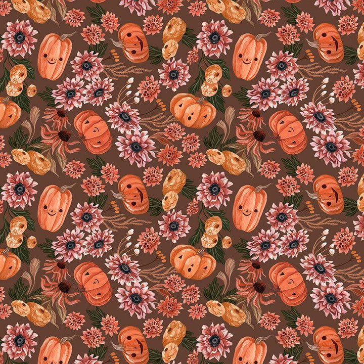 Made in USA by Retrolicious, 100% cotton Greta dress with a V-neck, gathered waist, pockets, and a playful pumpkin-floral print. Sizes XS–4X.