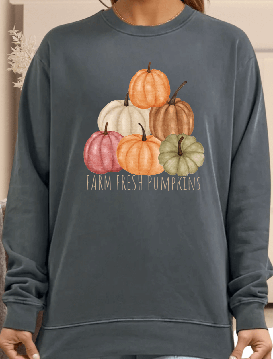 Embrace cozy fall vibes with the Farm Fresh Pumpkin Graphic Sweatshirt in a rich Evergreen shade. Crafted in USA from heavyweight, 100% preshrunk cotton