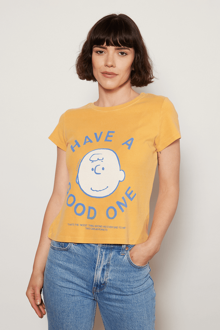 Add a little childhood nostalgia to your wardrobe. Our Peanuts "Have a Good One" Baby Tee is made in USA from 100% organic micro-rib cotton, making it ultra soft and body flattering. 
