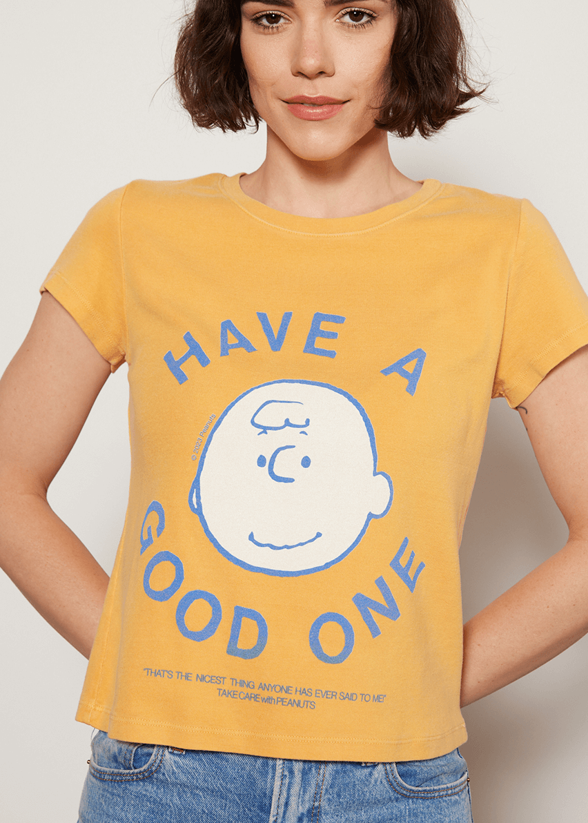 Add a little childhood nostalgia to your wardrobe. Our Peanuts "Have a Good One" Baby Tee is made in USA from 100% organic micro-rib cotton, making it ultra soft and body flattering. 