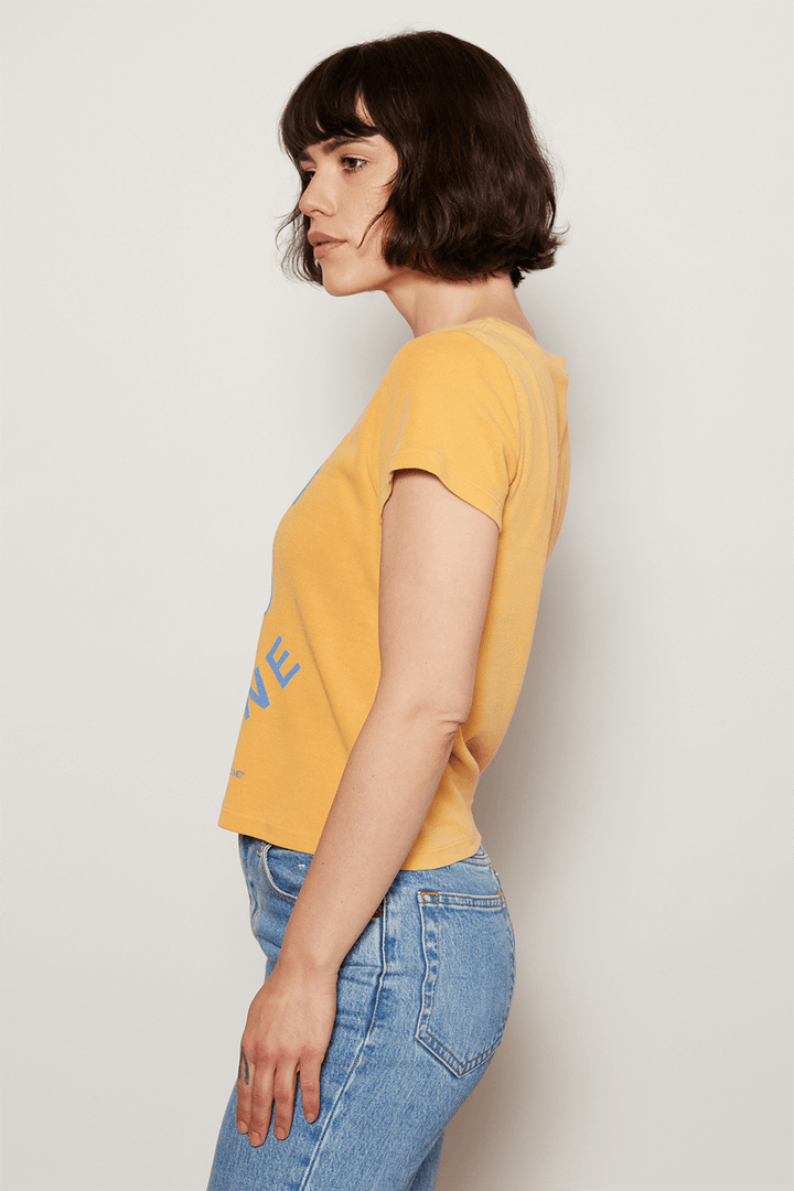 Add a little childhood nostalgia to your wardrobe. Our Peanuts "Have a Good One" Baby Tee is made in USA from 100% organic micro-rib cotton, making it ultra soft and body flattering. 