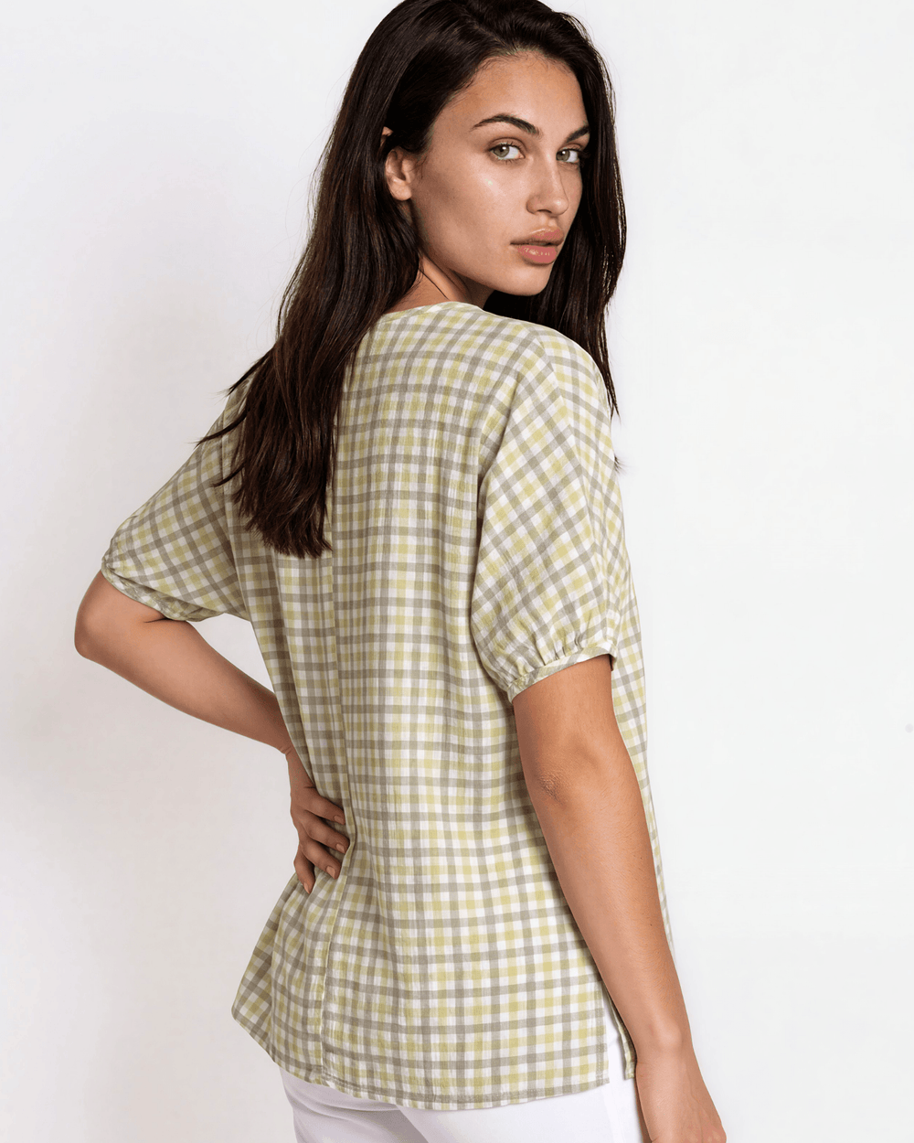 Sage green woven checkered plaid short sleeve top with a wide scoop neckline, rolled cuffs, and a relaxed boxy fit in lightweight 100% rayon. Made in USA.