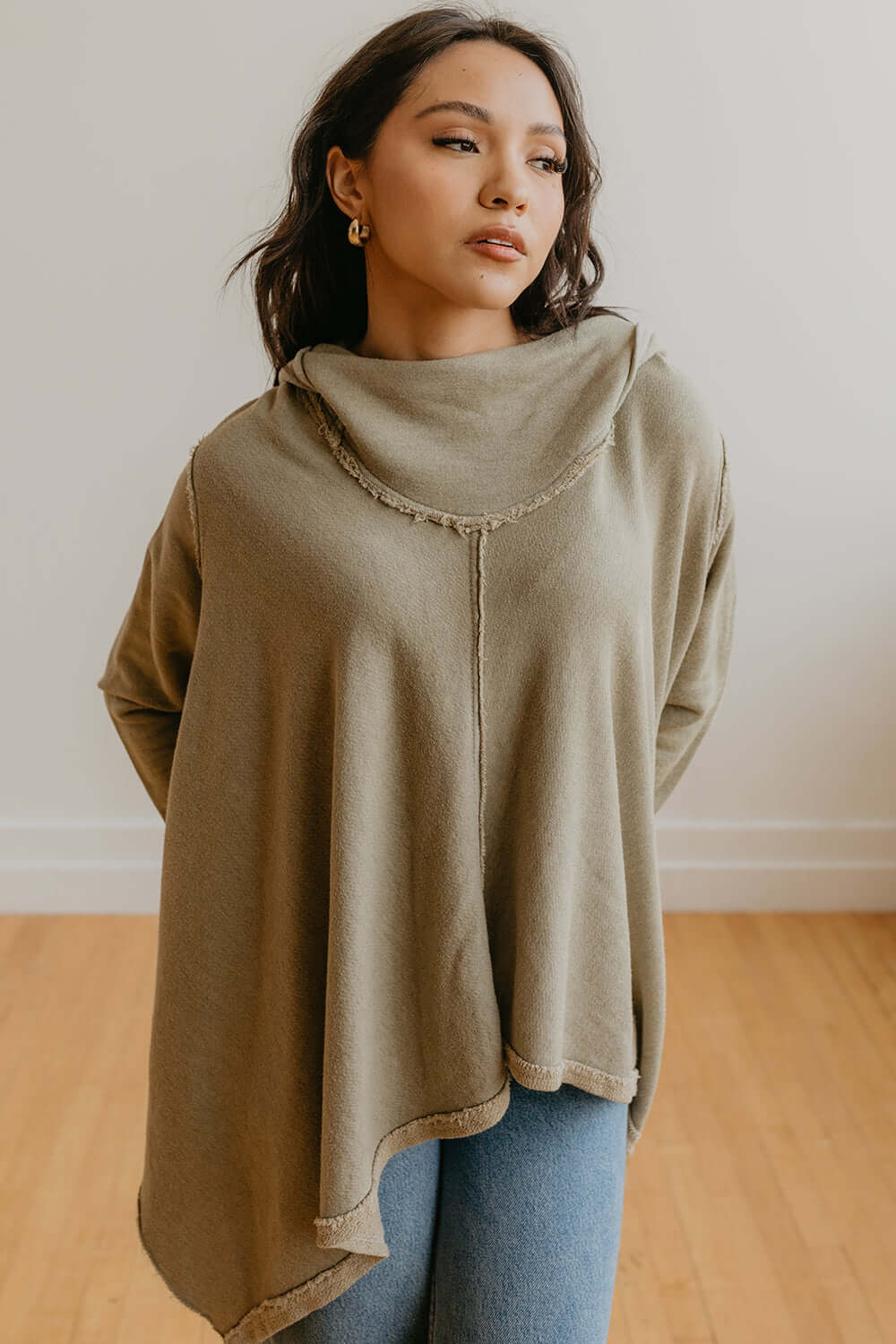 Effortlessly cool. This Free Spirit hoodie is oversized, but flattering. Dress it up with a pair of your favorite jeans or keep it cozy in sweats. + Olive / Black+ Available in S-XL+ Machine wash cold+ Tumble dry on low 100% Organic Cotton Ethically made in Los Angeles, CA