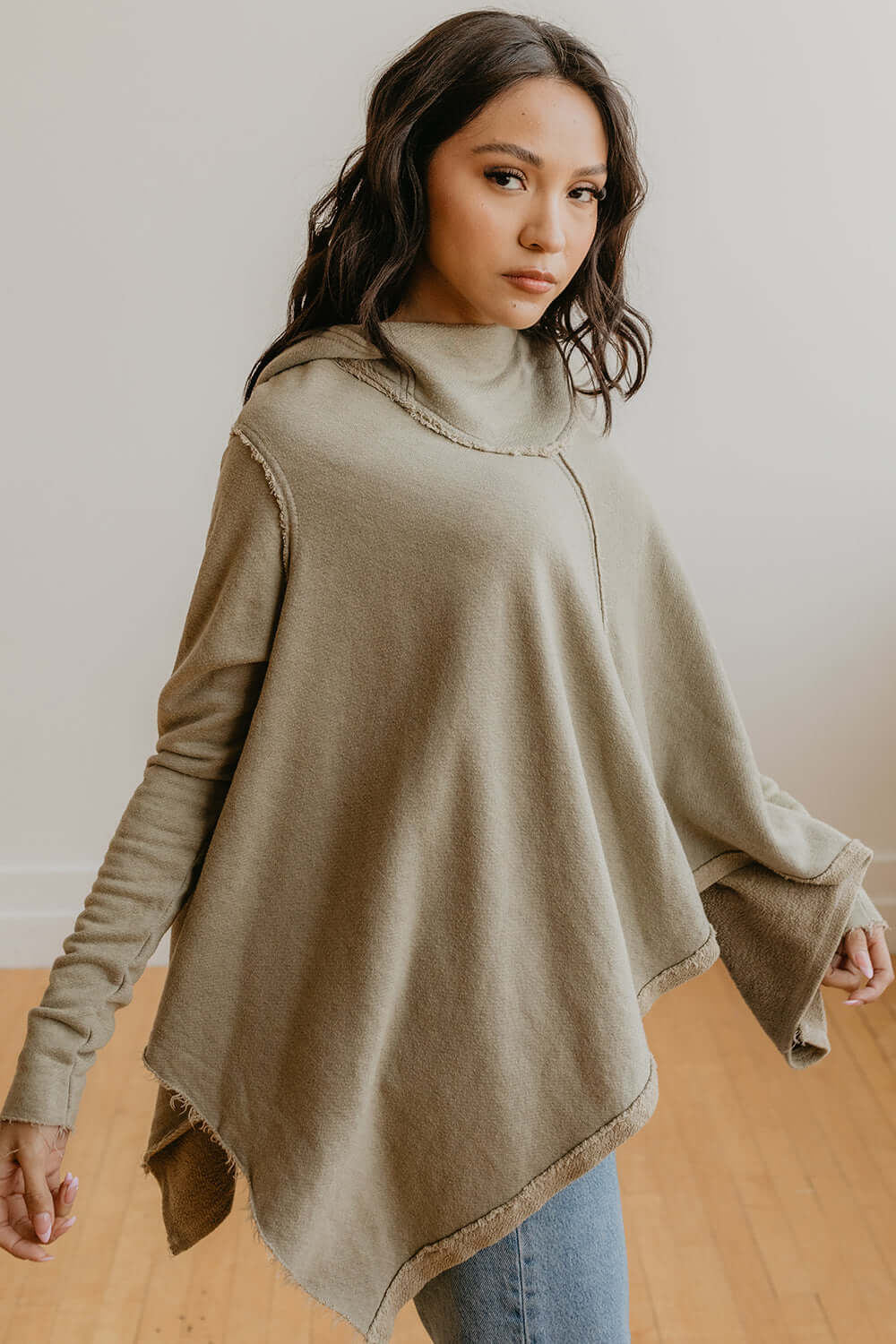 Effortlessly cool. This Free Spirit hoodie is oversized, but flattering. Dress it up with a pair of your favorite jeans or keep it cozy in sweats. + Olive / Black+ Available in S-XL+ Machine wash cold+ Tumble dry on low 100% Organic Cotton Ethically made in Los Angeles, CA