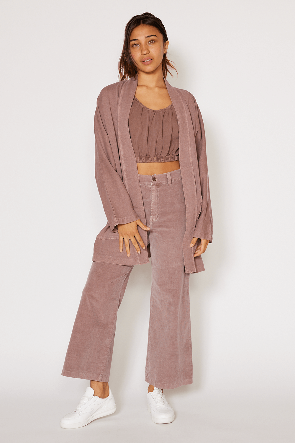 The Joni is our most stylish, fluid easy look cardigan. Knitted from 100% Organic Cotton, open front, long sleeve with two front pockets for comfort. Pair with our Perfect Tee, throw on a pair of jeans and you are ready to hit the city. + Vintage Black/ Sand Stone/ Desert Rose+ Machine wash cold/warm+ Tumble dry on low+ Available in S/M or L/XL 100% Organic Cotton Ethically made in Los Angeles, CA