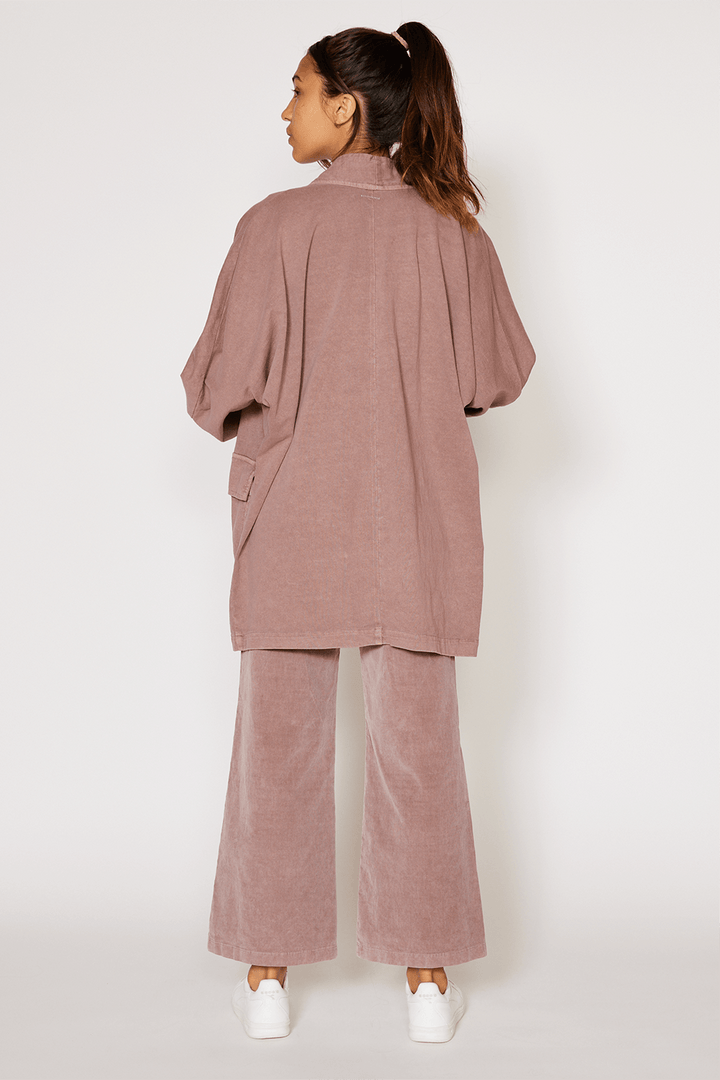 The Joni is our most stylish, fluid easy look cardigan. Knitted from 100% Organic Cotton, open front, long sleeve with two front pockets for comfort. Pair with our Perfect Tee, throw on a pair of jeans and you are ready to hit the city. + Vintage Black/ Sand Stone/ Desert Rose+ Machine wash cold/warm+ Tumble dry on low+ Available in S/M or L/XL 100% Organic Cotton Ethically made in Los Angeles, CA