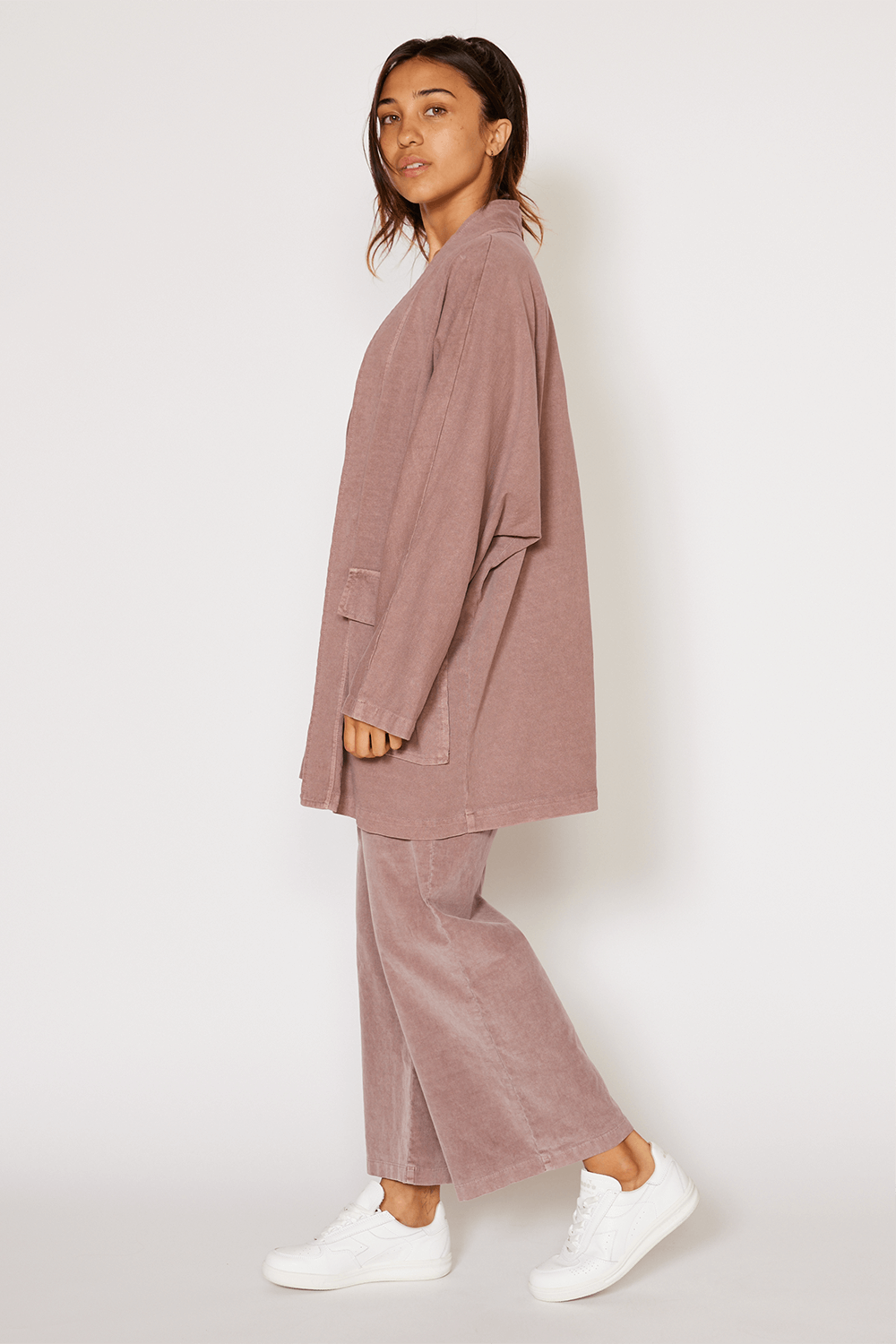 The Joni is our most stylish, fluid easy look cardigan. Knitted from 100% Organic Cotton, open front, long sleeve with two front pockets for comfort. Pair with our Perfect Tee, throw on a pair of jeans and you are ready to hit the city. + Vintage Black/ Sand Stone/ Desert Rose+ Machine wash cold/warm+ Tumble dry on low+ Available in S/M or L/XL 100% Organic Cotton Ethically made in Los Angeles, CA