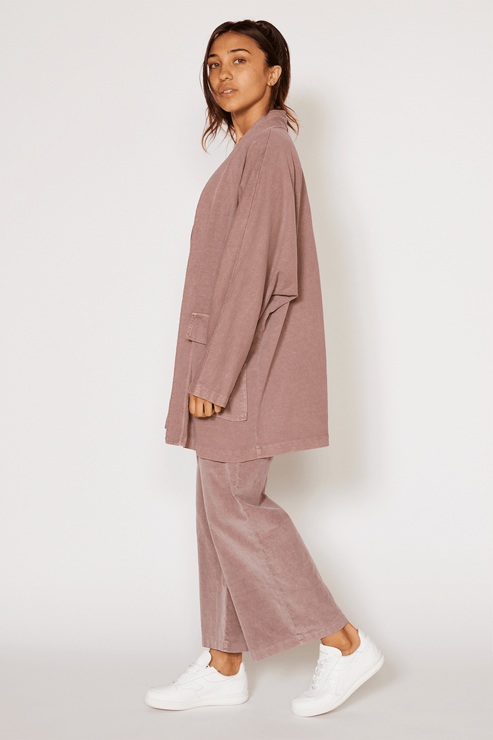 The Joni is our most stylish, fluid easy look cardigan. Knitted from 100% Organic Cotton, open front, long sleeve with two front pockets for comfort. Pair with our Perfect Tee, throw on a pair of jeans and you are ready to hit the city. + Vintage Black/ Sand Stone/ Desert Rose+ Machine wash cold/warm+ Tumble dry on low+ Available in S/M or L/XL 100% Organic Cotton Ethically made in Los Angeles, CA