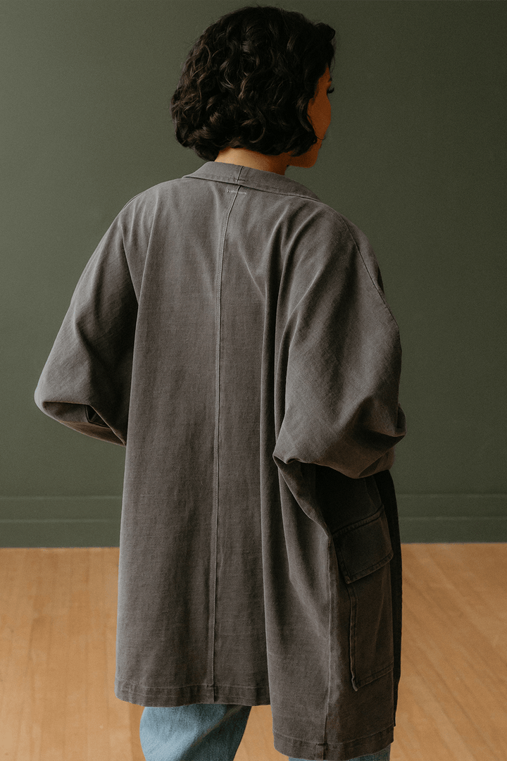 The Joni is our most stylish, fluid easy look cardigan. Knitted from 100% Organic Cotton, open front, long sleeve with two front pockets for comfort. Pair with our Perfect Tee, throw on a pair of jeans and you are ready to hit the city. + Vintage Black/ Sand Stone/ Desert Rose+ Machine wash cold/warm+ Tumble dry on low+ Available in S/M or L/XL 100% Organic Cotton Ethically made in Los Angeles, CA