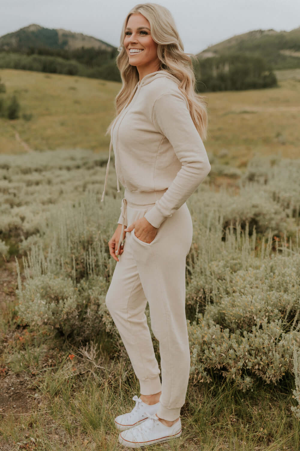 This vintage inspired cropped hoodie is made from light-weight 100% organic cotton. Wear this on a cozy coffee date on an overcast day or a movie night in with friends.  100% Organic Cotton Made in USA