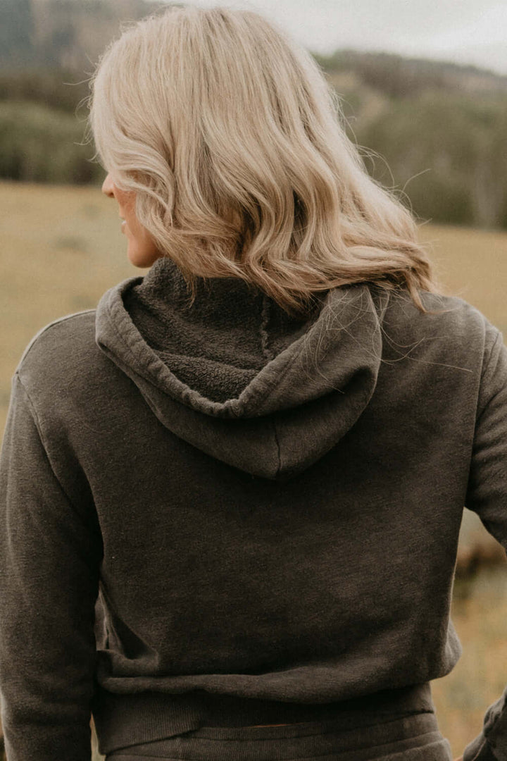 This vintage inspired cropped hoodie is made from light-weight 100% organic cotton. Wear this on a cozy coffee date on an overcast day or a movie night in with friends.  100% Organic Cotton Made in USA