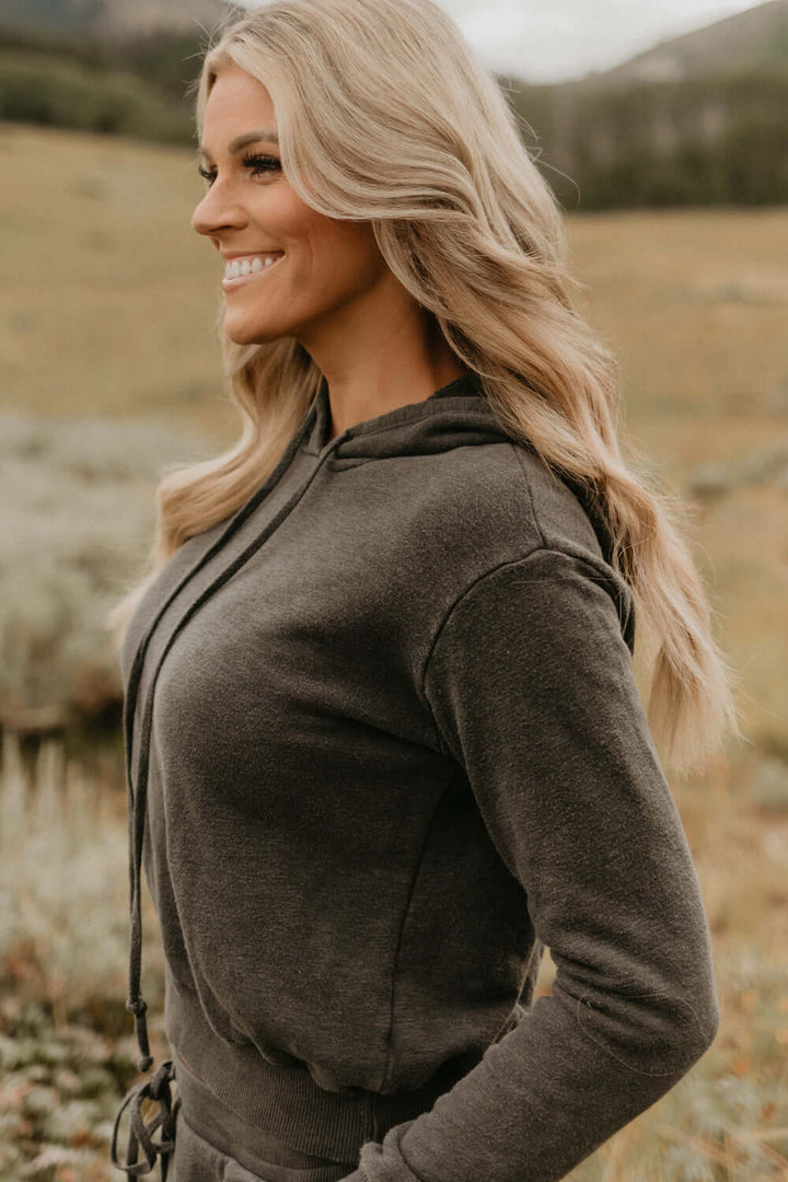 This vintage inspired cropped hoodie is made from light-weight 100% organic cotton. Wear this on a cozy coffee date on an overcast day or a movie night in with friends.  100% Organic Cotton Made in USA