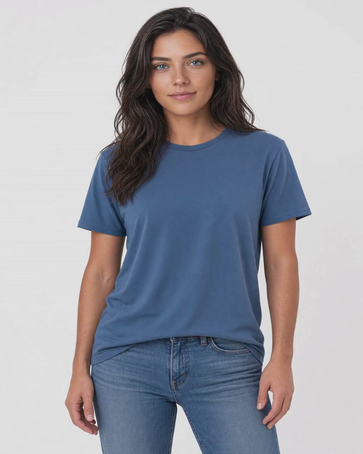 Made in USA The Boyfriend Cotton Washed T-Shirt - Blue Steel: front view of blue crew neck short sleeve tee on female model with jeans