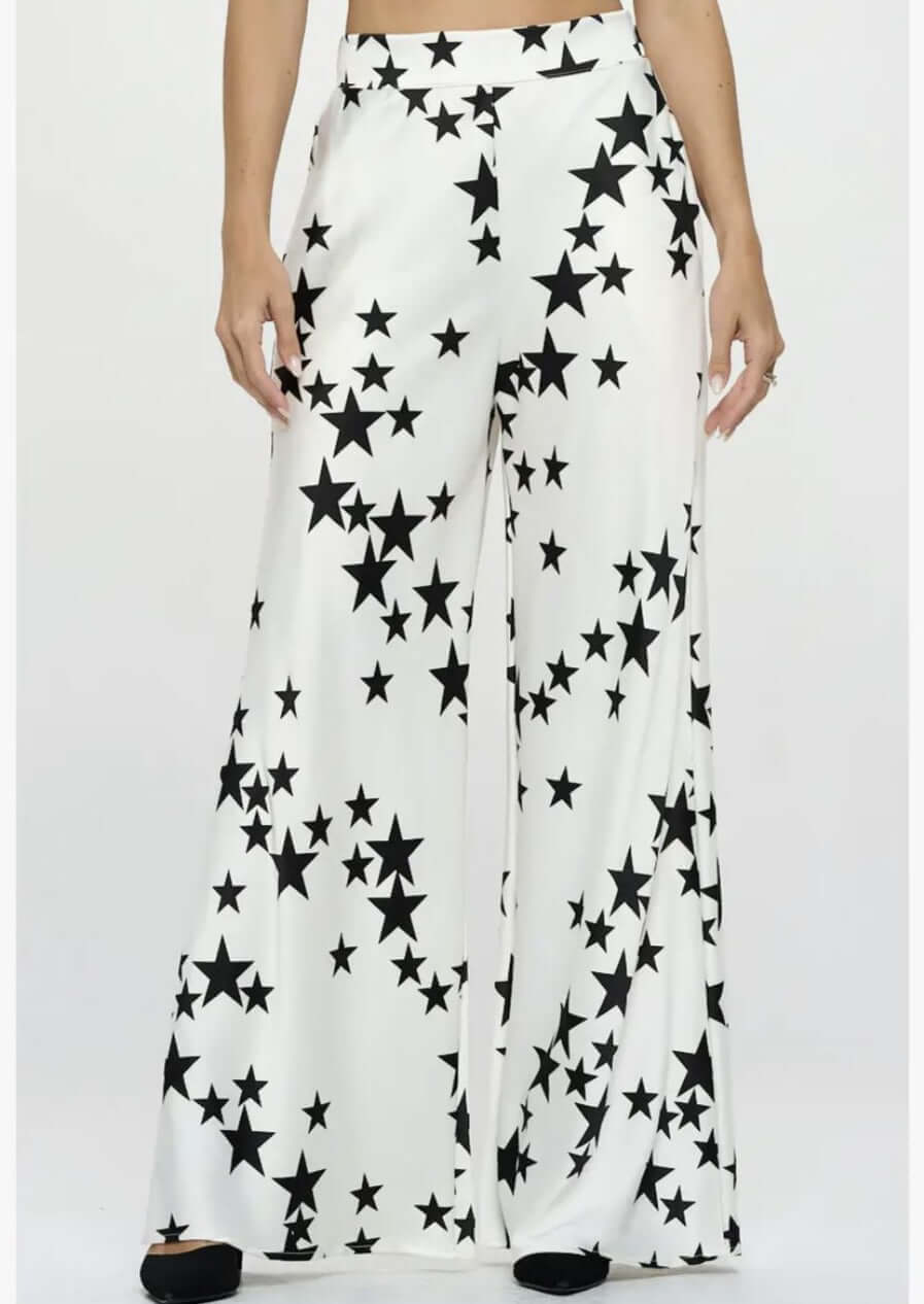 USA Made Ladies White with Black Star Print Wide Leg Pants with Pockets made from Stretch Satin Material | Renee C. Style# 4596PTC | Classy Cozy Cool Women's Made in America Boutique