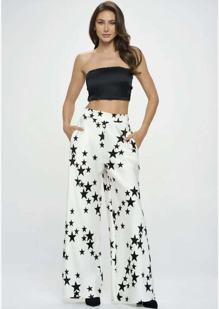 USA Made Ladies White with Black Star Print Wide Leg Pants with Pockets made from Stretch Satin Material | Renee C. Style# 4596PTC | Classy Cozy Cool Women's Made in America Boutique