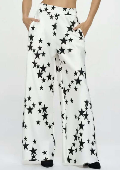 USA Made Ladies White with Black Star Print Wide Leg Pants with Pockets made from Stretch Satin Material | Renee C. Style# 4596PTC | Classy Cozy Cool Women's Made in America Boutique