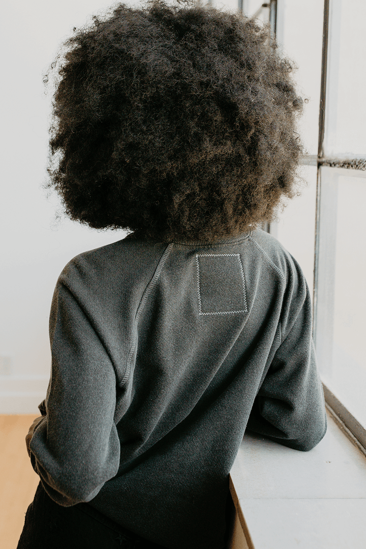 Plunge into the iconic age of rock with the Sticky Fingers Sweatshirt by the Rolling Stones. Composed of 50% organic cotton / 50% recycled polyester, this gender-neutral sweatshirt in a faded black shade is a salute to both the legendary band and eco-responsibility.