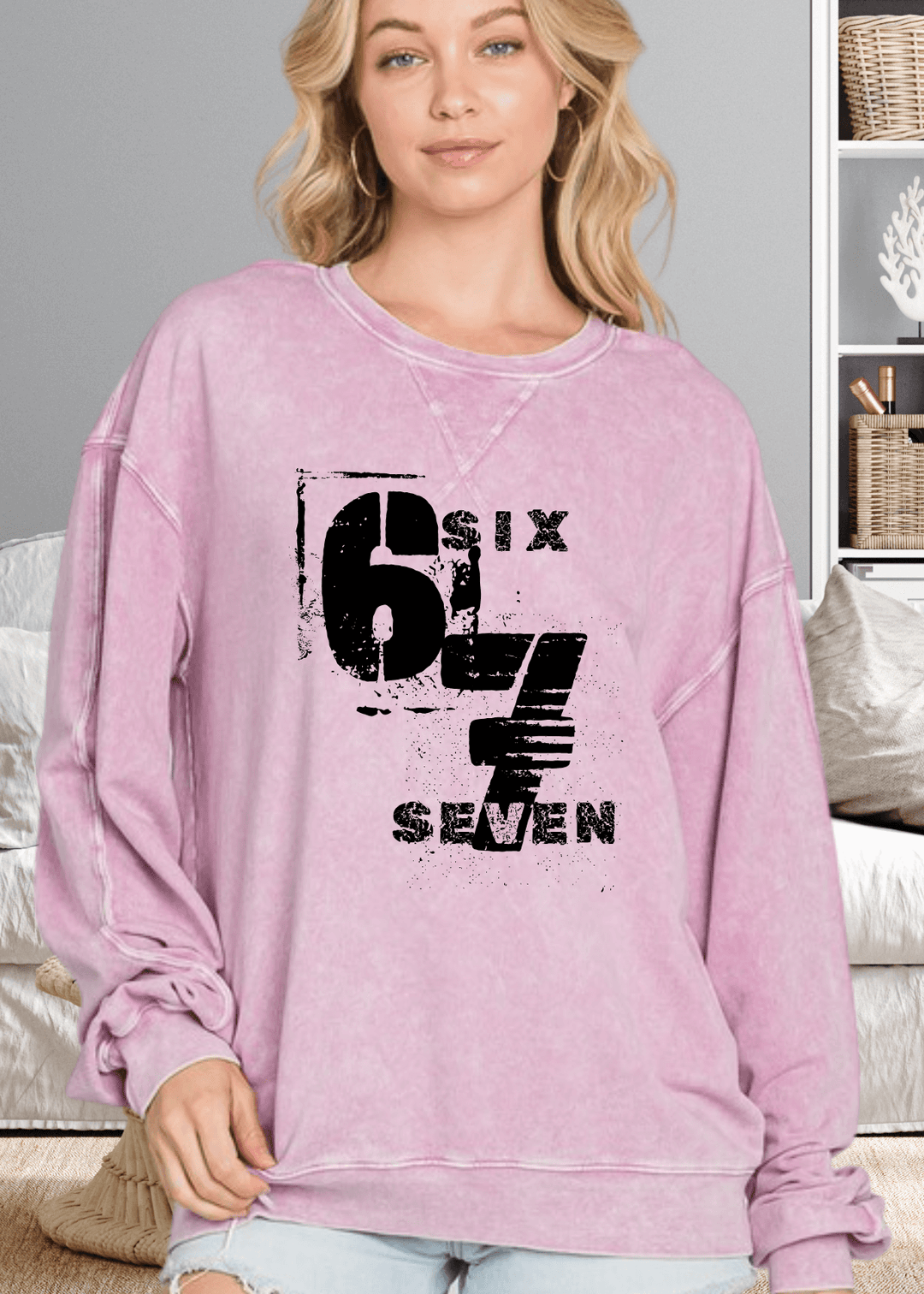 Oversized comfort meets effortless style with this Six Seven graphic top, crafted from premium USA cotton in a light-medium weight perfect for any season. The mineral-washed finish gives it that coveted lived-in look, while chunky sleeves and a round neck with subtle stitch detailing add personality to your everyday rotation.