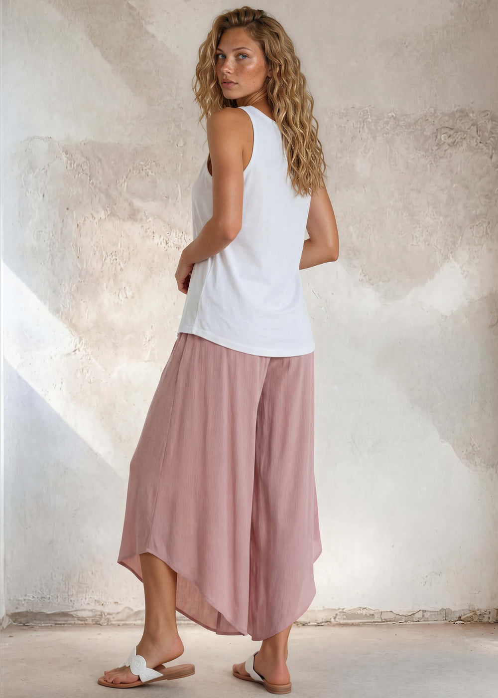 Say it in something made here! USA-made Patriotic Pink USA Flag Graphic tank in white garment wash. Soft 95% cotton, relaxed fit, grown & sewn in America.